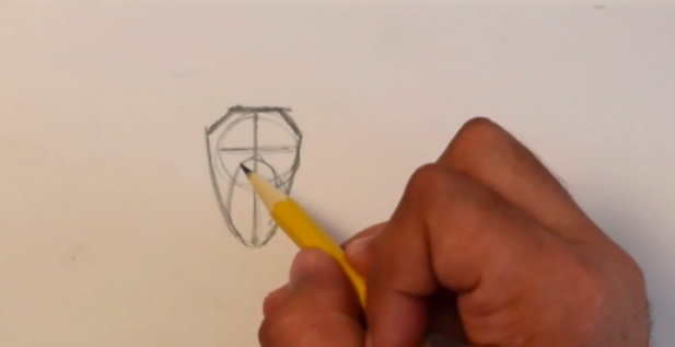 Frame the face with additional lines before adding the facial features.
