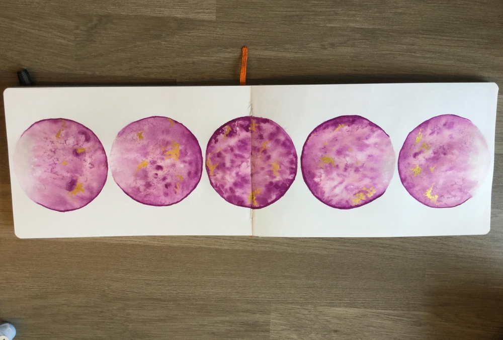 The texture of the surface of the moon was created by sprinkling salt on wet paint. Student work by Angela Davis