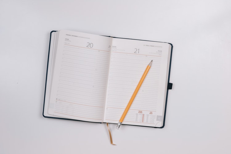 Obtain a planner. Step 2: conquer the world (via Unsplash )
