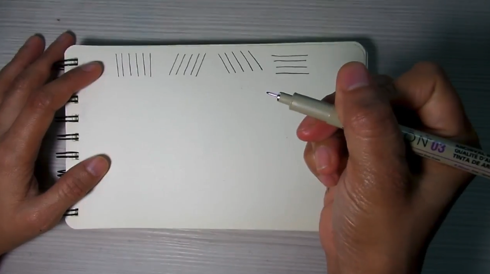 Skillshare instructor Madonna Creates demonstrates the different types of straight lines that you can draw as you begin to learn line art techniques.
