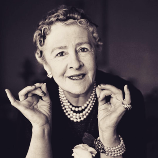 Image via Instagram @cmunm Syrie Maugham posing in pearls.
