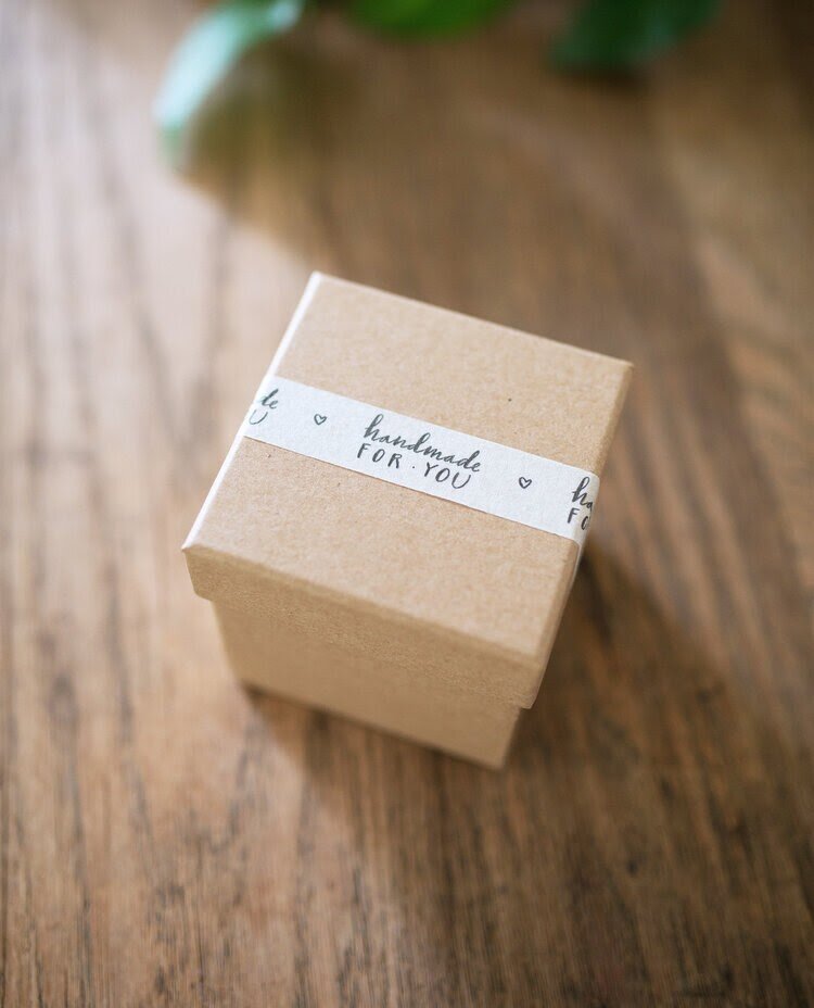 Source: Bryn Chernoff’s Paperfinger shop A simple line of tape can add a ton of visual interest to your gift.