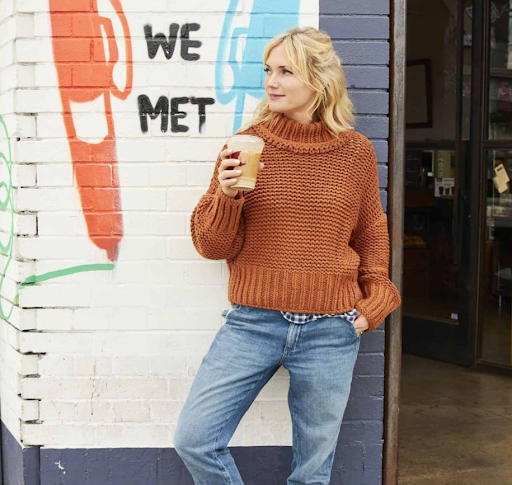 Image via Instagram @em_henderson Emily Henderson with a cup of coffee.