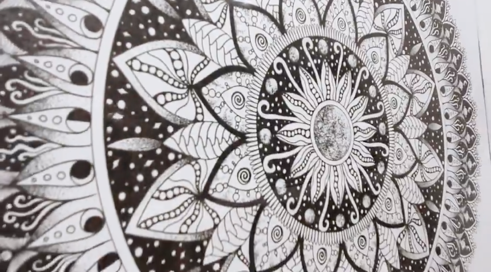 Skillshare instructor Altea Alessandroni shows a completed, nature-inspired mandala. 