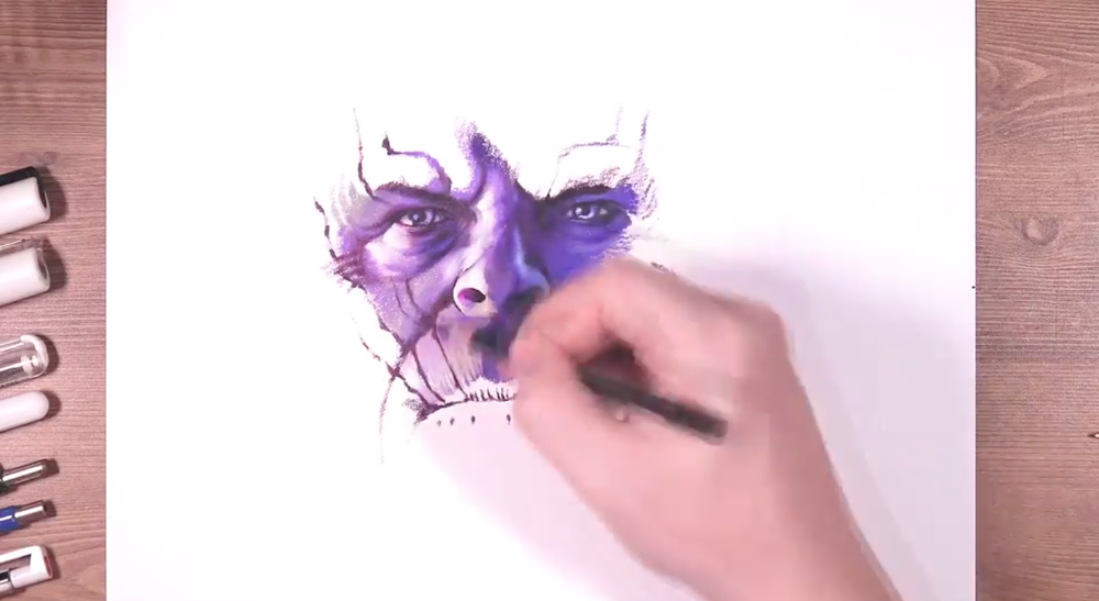 Skillshare instructor Jason draws the face of an animated character.