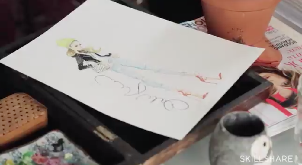 Skillshare instructor Dallas Shaw creates a fashion design of a woman’s outfit.