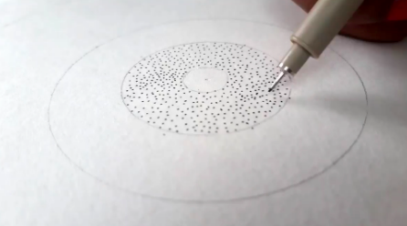 Adding dots, known as stippling, gives your sunflower a realistic look.