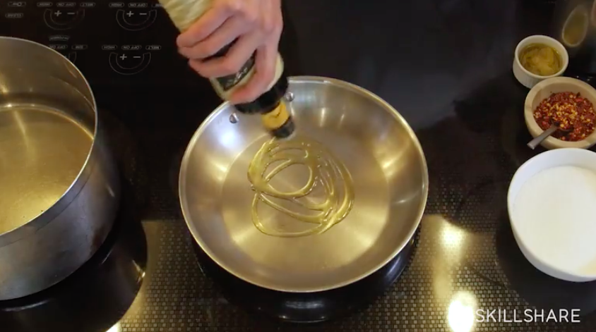 Olive oil, heated through, is the base of your sauce.
