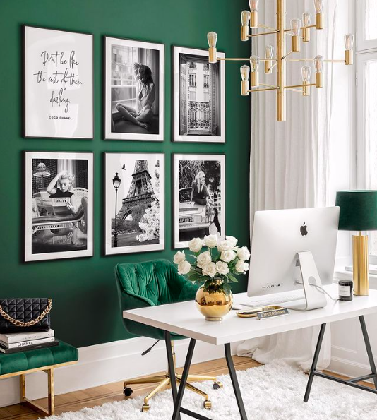 Source: Instagram A gallery wall can bring color and personal flair to your office.