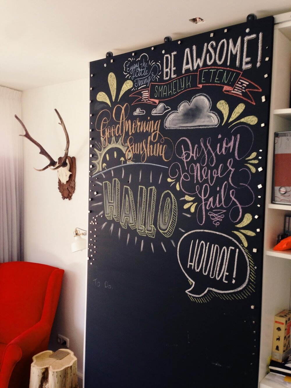 Chalkboard paint is fun and functional for a home office, as this mural by visual designer John Somers shows.