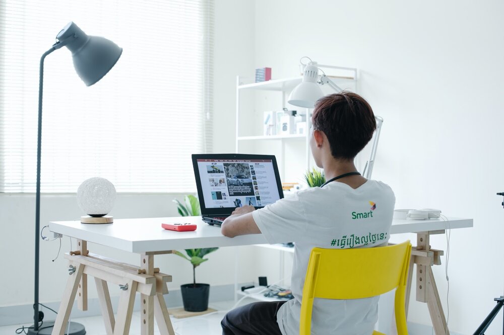 Source: Unsplash You can establish a home office in the middle of a larger space, if necessary.
