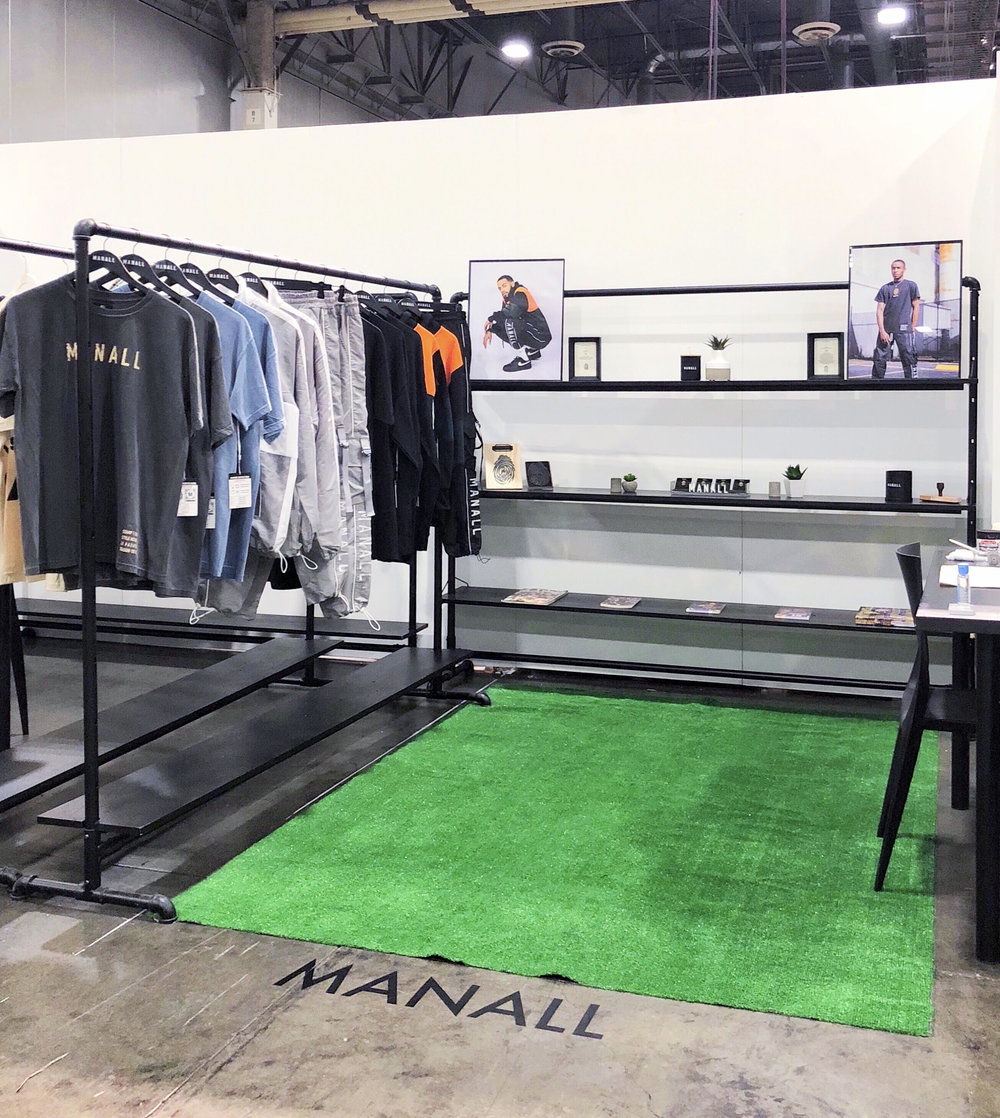 The M A N A L L booth