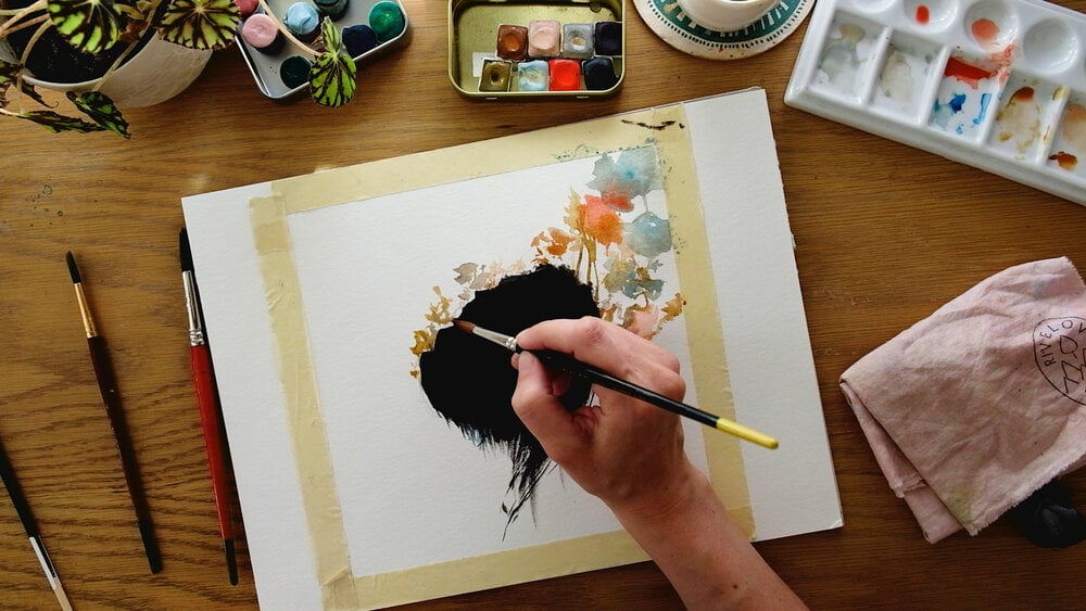 Photo of the watercolor process provided by Marie-Noëlle Wurm .