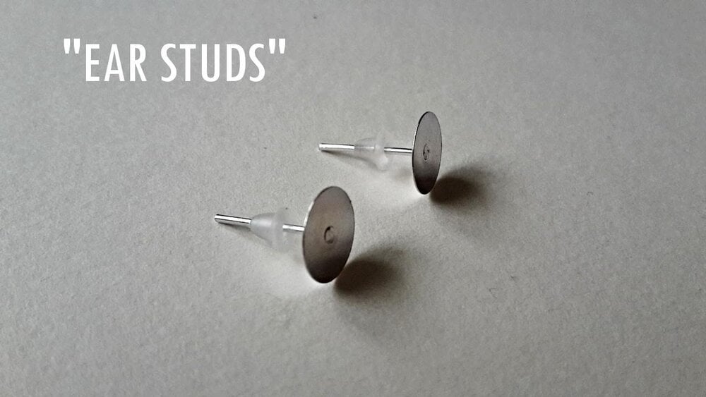 The earring components needed to make your own stud earrings.