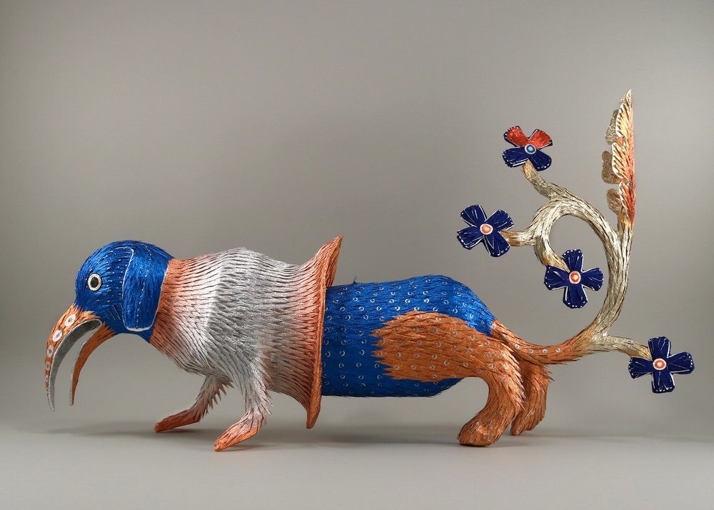 ‘Illuminated Piñata No. 2’ (paper, paperboard, crepe paper, glue and wire, 32x9x19") by Roberto Benavidez