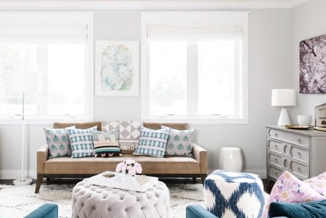 Using a base color—like the grey and blue featured in this room—helps to tie together all of the elements in your eclectic design.