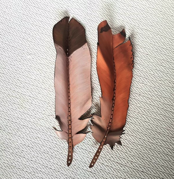 These leather feathers look like the real thing. Image via    Instagram   .