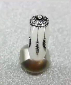 Intricate dreamcatcher nails
