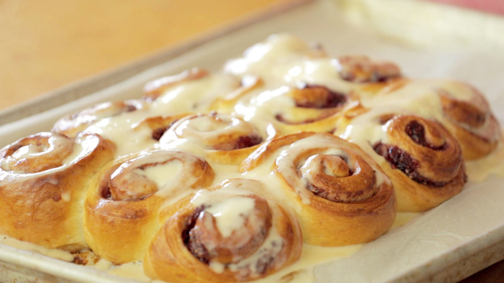 Julia Turshen's Raspberry Jam Buns with Creme Fraiche Frosting. Check out her Skillshare class for the full recipe!