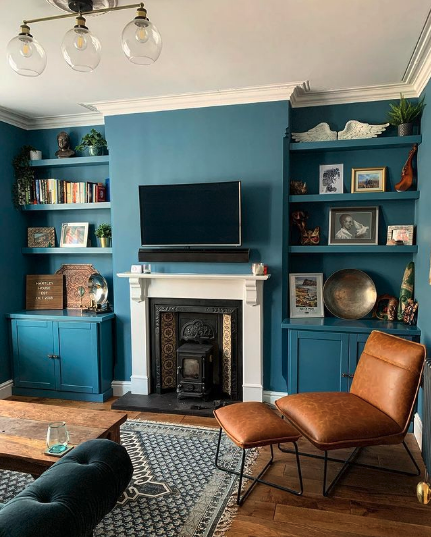 Original features like fireplaces are ideal to plan around when you’re working on your eclectic interior design.