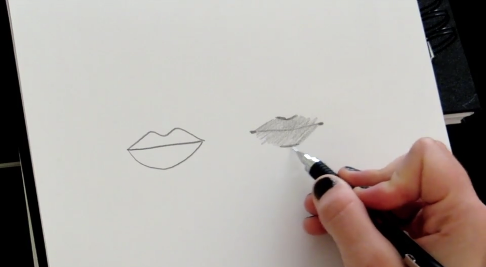 Use a darker tone to add shadow at the top and bottom of the lips.