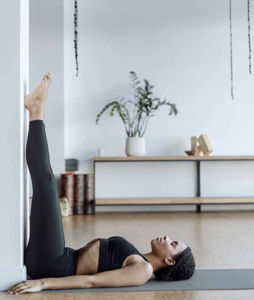 laying with legs up the wall