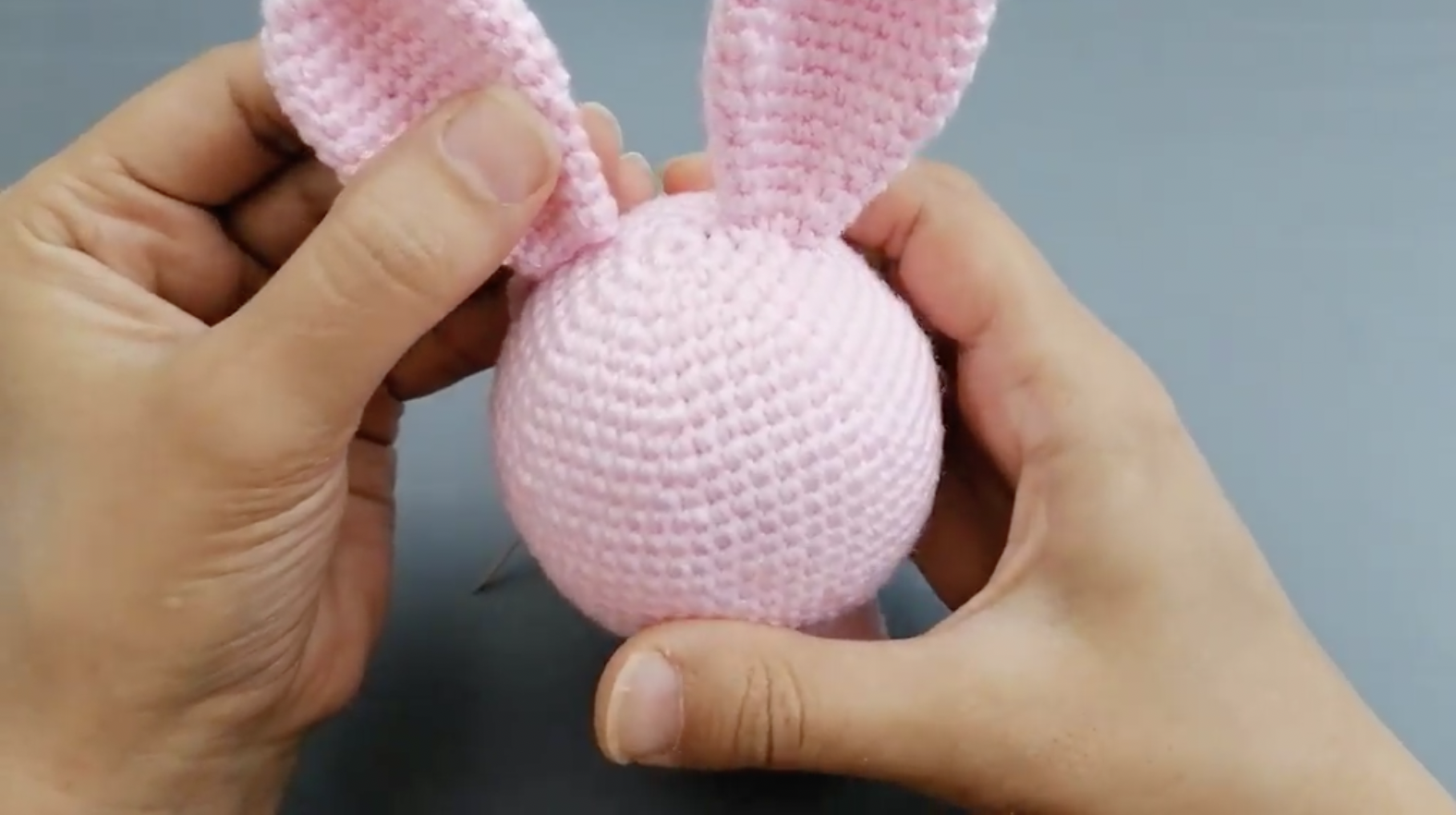 pink crochet ball with ears