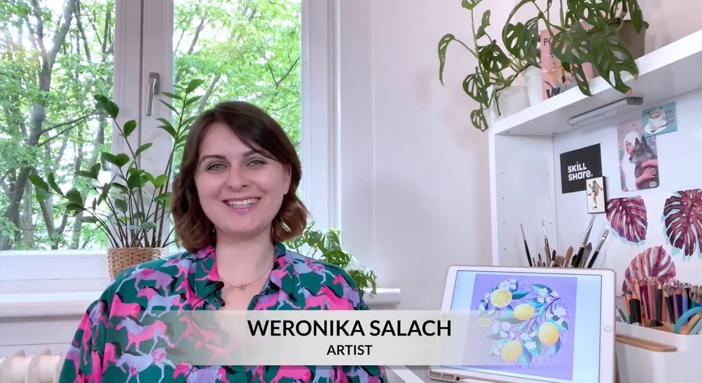 This course’s teacher, Weronika Salach, sits in her office next to an iPad, which displays an image of one of her botanical drawings. 