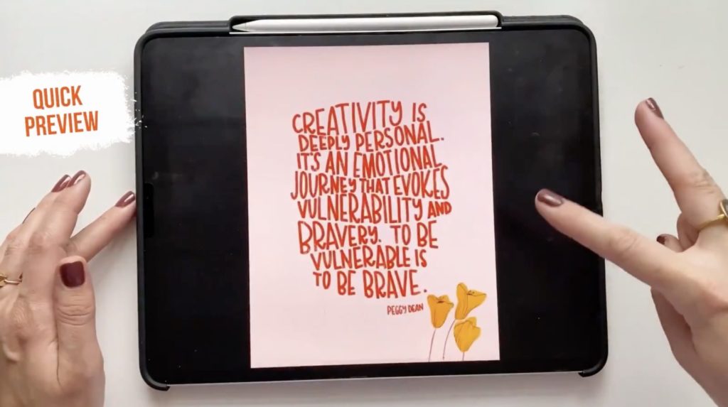 An iPad displaying stylized red text on a pink background reading “Creativity is deeply personal. It’s an emotional journey that evokes vulnerability and bravery. To be vulnerable is to be brave. Peggy Dean.” Peggy’s hands are also visible in the shot.