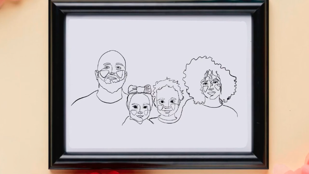 A framed one-line drawing of a family of four, featuring a man, two children in the middle, and a woman