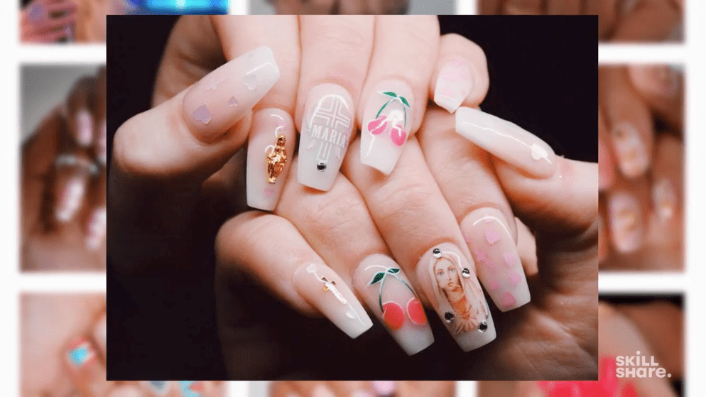 Artificial nails with various intricate designs and gem embellishments.