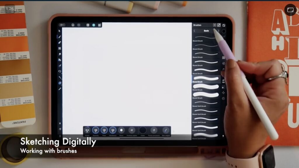 Hand with apple pen over an ipad choosing a brush on Affinity Design software.