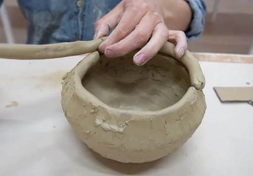 How To Throw Clay On The Pottery Wheel: A Step-by-Step Beginners Guide -  Pottery Crafters