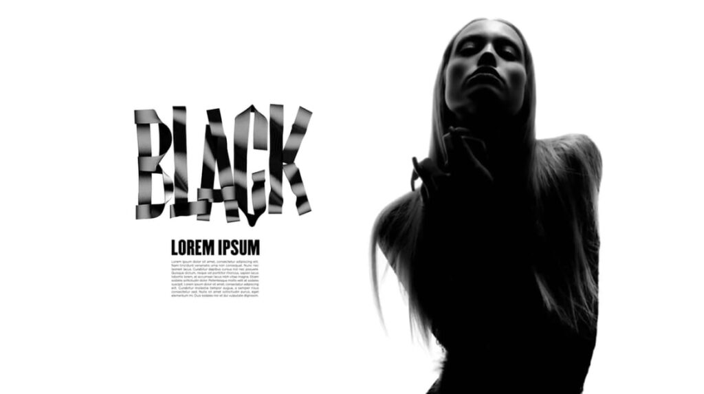 A magazine article layout in black and white. On the right side of the page is a photo of a person with long hair posing for the camera. On the left side is the word ‘black’ in large letters, with a paragraph of smaller text underneath it. 