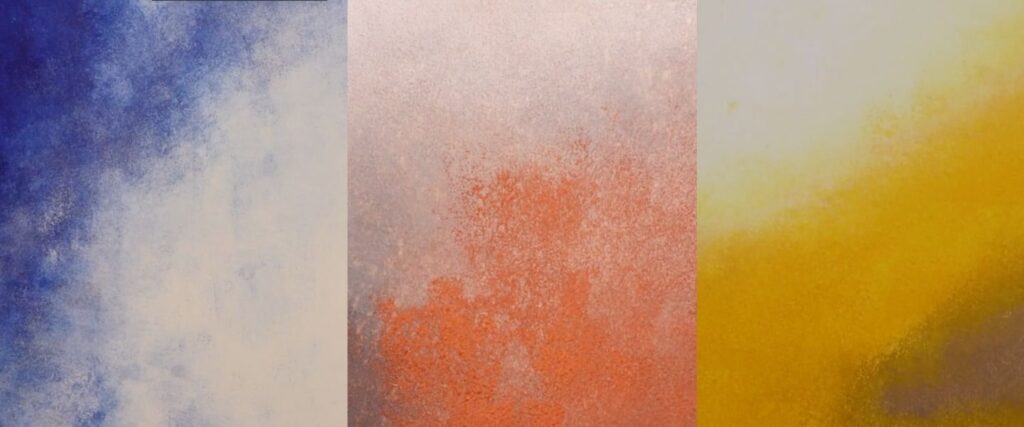Three sponge paintings that fade in color. The left fades from blue to white, the middle fades from a deep orange to a faint orange, and the right fades from brown to yellow and white.