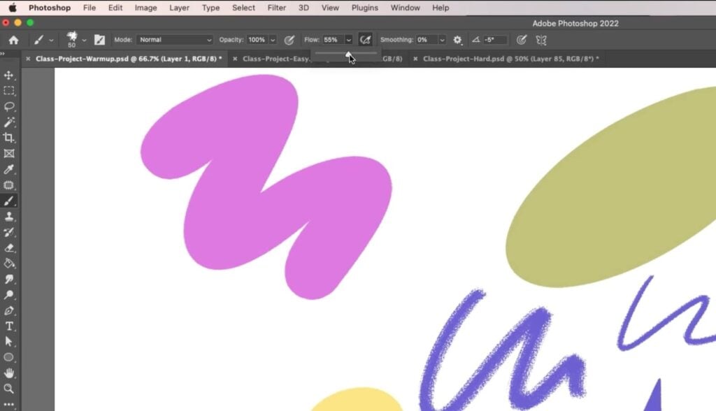 Photoshop is open to a canvas containing a few squiggles and circles. The mouse is hovering over the “Flow” slider in the top toolbar. 