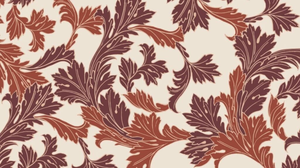 An acanthus design on a beige background. The leaves are rust orange and deep eggplant colored.