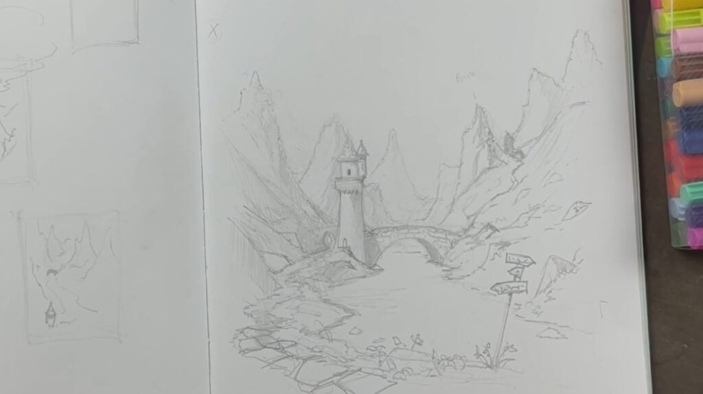 The white page of a sketchbook filled with a pencil drawing of a medieval tower and bridge in a valley between several mountains.