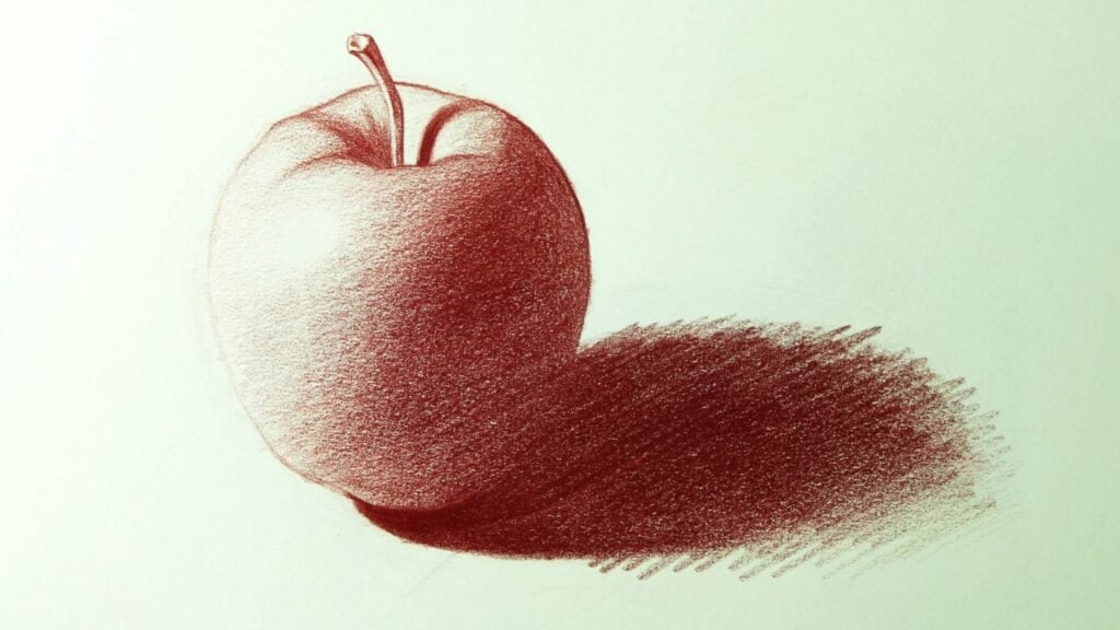 A still life pencil drawing done in red pencil on white paper. The drawing emphasizes the shading of the apple and the shadow it casts.