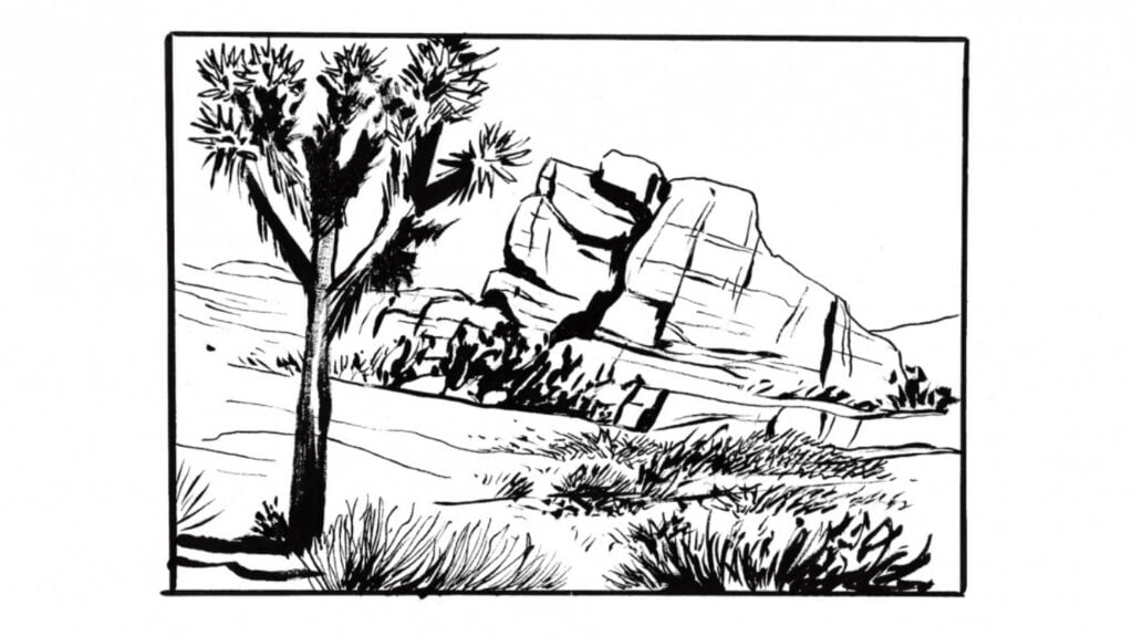 An black and white ink drawing of a Joshua tree growing in the desert in front of a large rock formation.