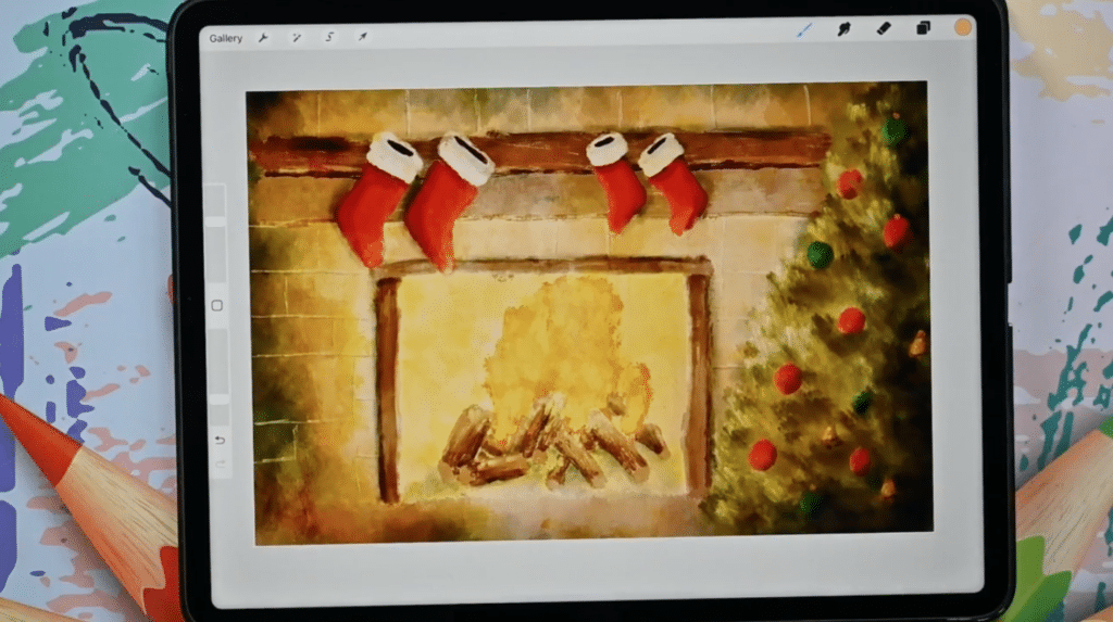 An iPad sits on a colorful background with swatches of different colors like purple, pink and blue. The iPad is open to Procreate and a canvas that contains a holiday scene with an oil paint effect. The scene is of a fire burning in a fireplace, four stockings hanging on the mantle and a Christmas tree in the right corner.