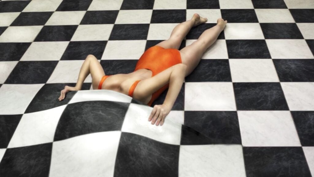 Image of a person in an orange, one-piece swimsuit laying face down on a black and white checkered floor, with their head appearing to be tucked under the floor, as if it’s a blanket 