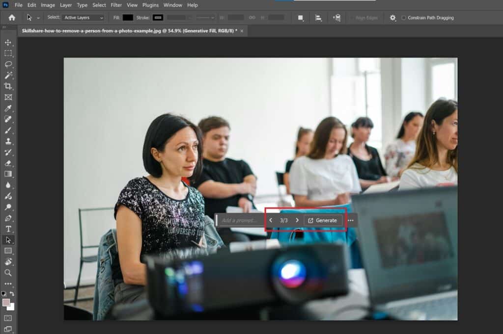 The person on the left of the lecture image has been replaced with a blank wall and an empty chair. A red rectangle indicates where to cycle through different variations or generate new ones.