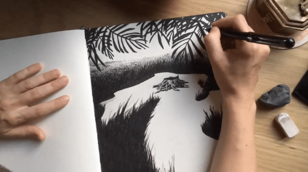 An artist creates a wooded scene featuring an array of textures with a black brush pen.