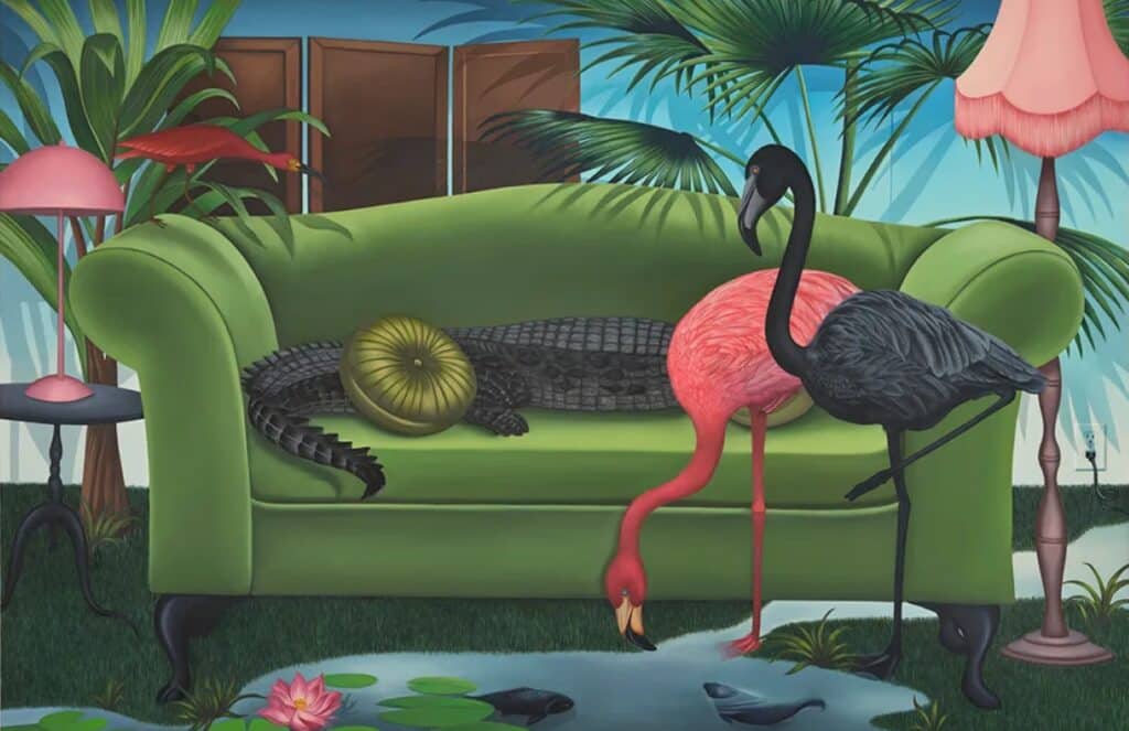 A painting of two flamingos and an alligator resting on and near a green sofa.