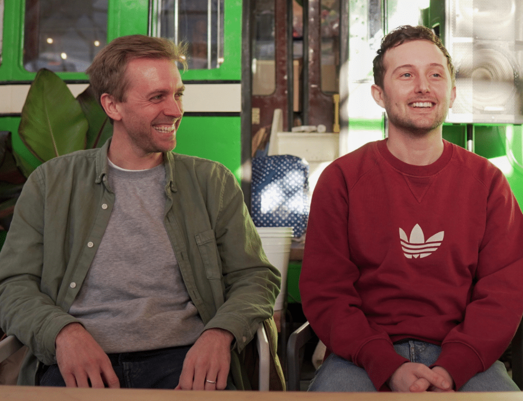 two smiling men